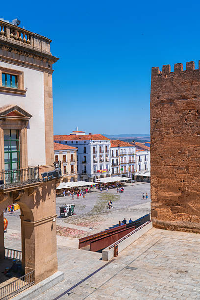 Historic architecture and businesses in the main square historic Unesco World Heritage City, Caceres, Extremadura, Spain on Sunday 2nd June 2024