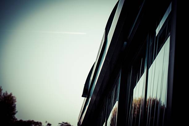 istock Modern Building Roofline and Glass Facade 2207071308