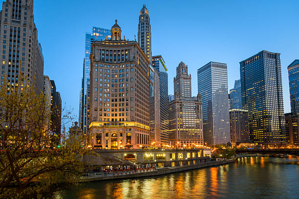 istock Chicago skyline and river under clear sky at twilight 2207071644