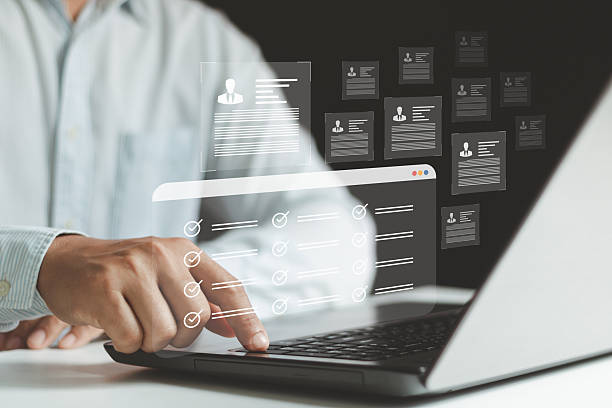 istock Online digital survey questionnaire on laptop with the checklist application. Complete test an online satisfaction survey form. Assessment for business research to rank customer service technology. 2207073497
