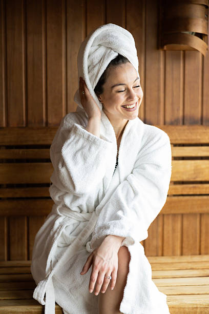 istock Content woman enjoying a sauna moment 2207073987