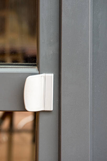 istock modern metal door handle on a modern gray frame of a door frame 2207075986