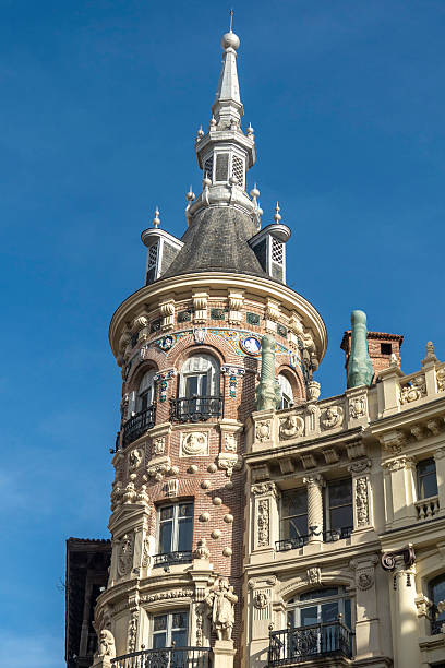 istock A very tall building that has a prominent tower located at its top 2207083034