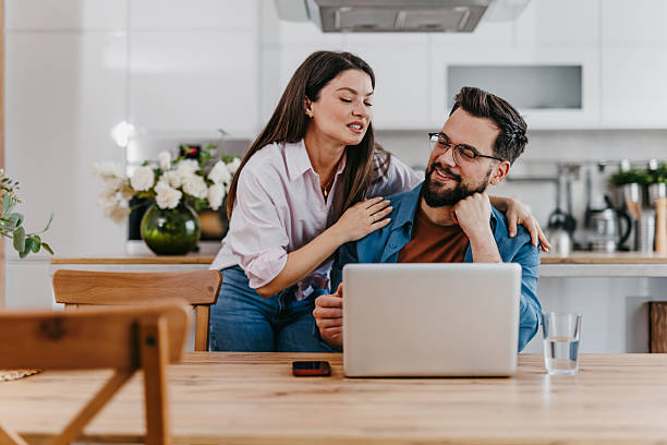 istock Couple watching funny videos 2207089094