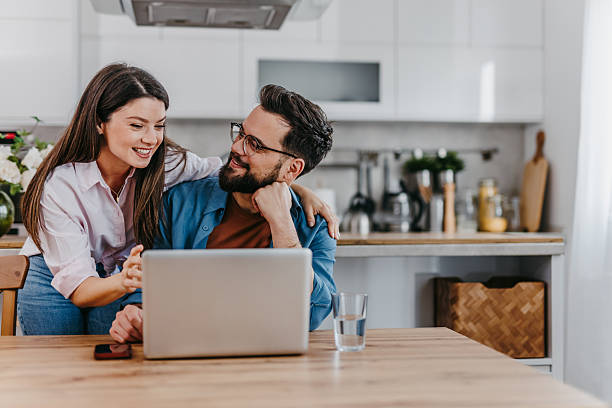 istock Couple watching funny videos 2207089095