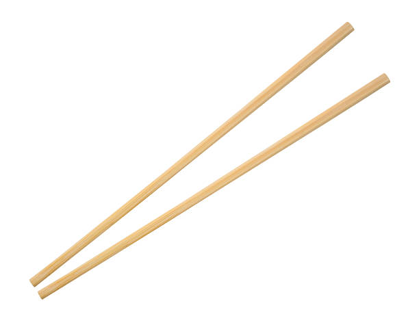 istock wooden chopsticks isolated on white background 2207090365