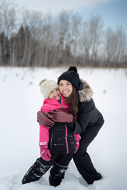 istock Mother & Daughter Snow Day 2207090593