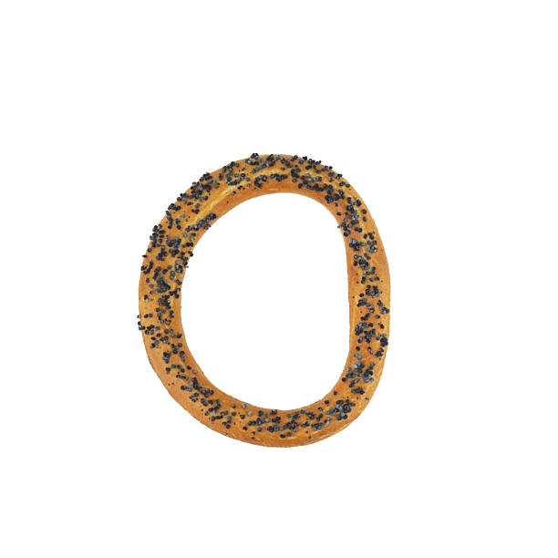 istock Single Poppy Seed Bagel Isolated on White 2207091143