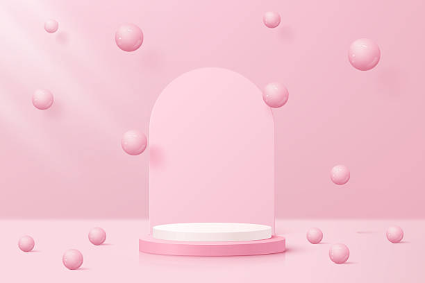 istock 3d pink and white podium, stage with a rounded backdrop and floating spheres. With pink background. Luxury and soft touch style mockup scene for showcasing beauty products display. 2207093966