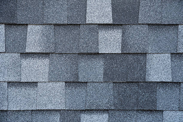 istock Gray bituminous tile with gradation of shades and grainy texture 2207096869