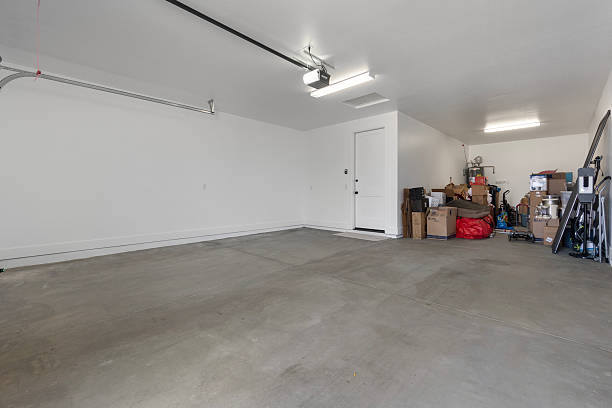 istock An open garage filled with many boxes on the floor 2207101802