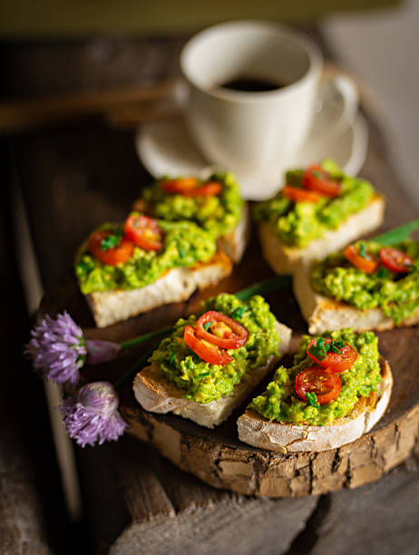 istock Avocado Toast with Cherry Tomatoes and Fresh Herbs 2207104707