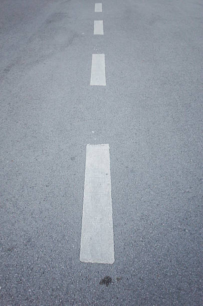 istock asphalt road with marking lines 2207104843