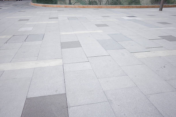 istock Grey brick stone street road. 2207104852
