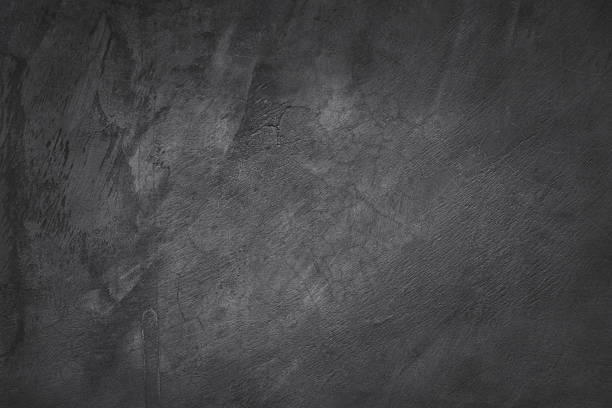 istock Dark grey concrete cement wall texture background with old and vintage style. 2207110906