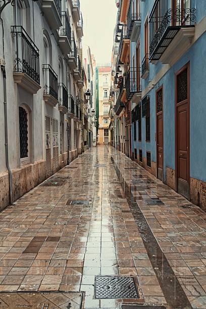 istock Stone pavement in Valencia's old town after the rain 2207112030