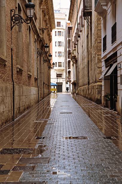 istock Stone pavement in Valencia's old town after the rain 2207112031