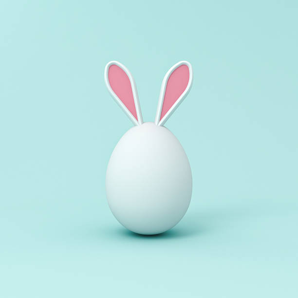 istock Minimal white Easter bunny egg isolated on light blue green cyan background with shadow minimal creative idea conceptual 3D rendering 2207117026