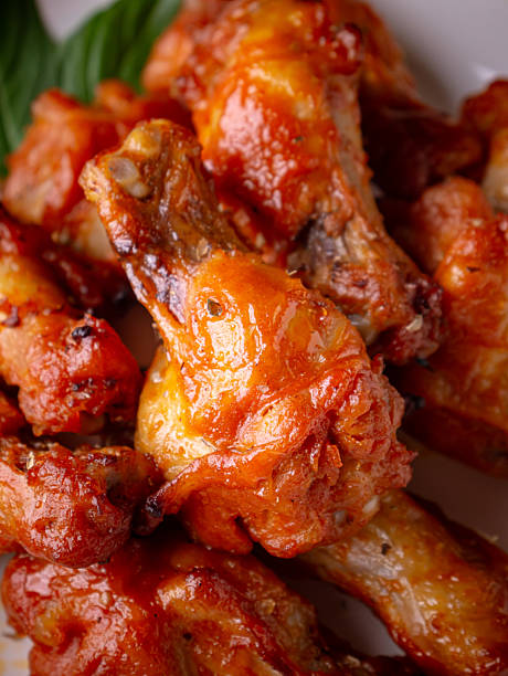 istock Classic New Orleans BBQ Roasted chicken buffalo wings. 2207120238