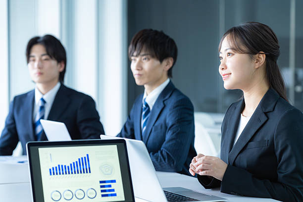 istock young businessmen having a meeting 2207122059