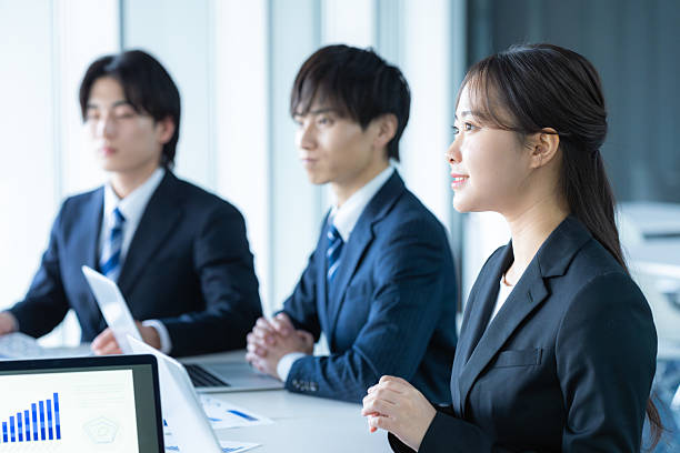 istock young businessmen having a meeting 2207122088