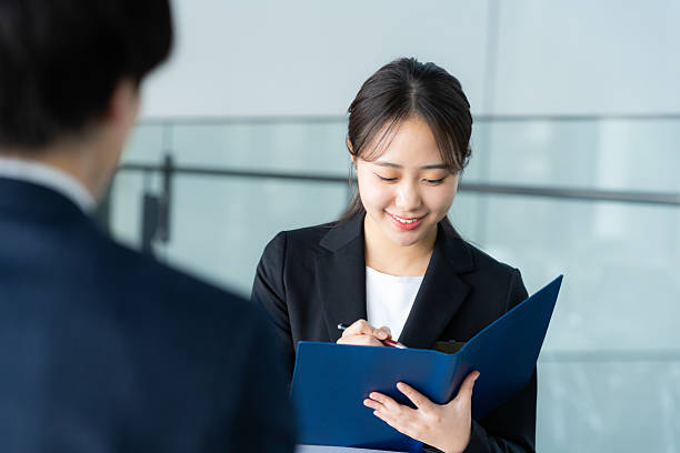 istock Consultant woman at reception 2207122091