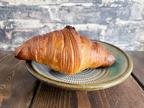 istock Croissant baked in a toaster oven 2207123037
