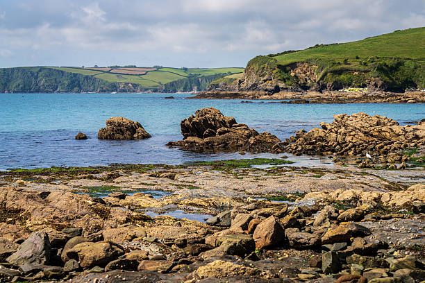 Channel coast with beach and cliffs near Trenarren, Cornwall, England, UK