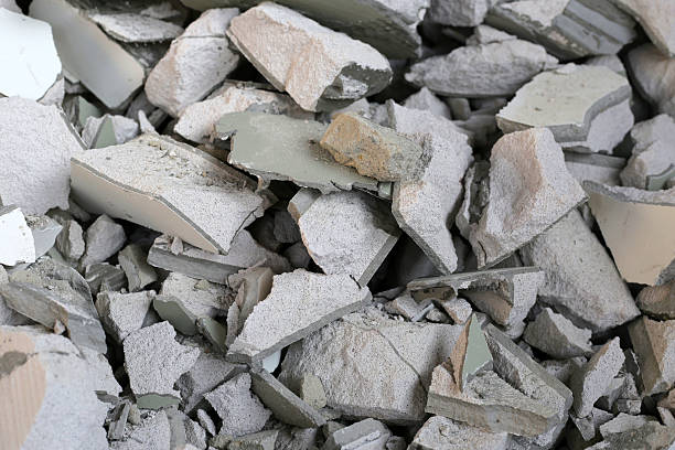 istock Broken concrete, Piles of lightweight construction bricks after house demolition 2207127746