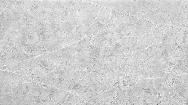 istock A grey wall with a grey background. The wall is made of concrete and has a rough texture 2207128545