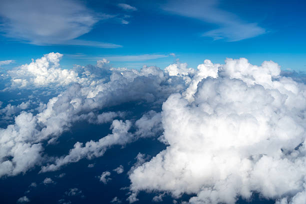 istock Aerial view of fluffy clouds over the Pacific Ocean in Polynesia 2207132349