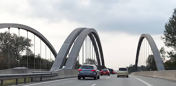 istock View of a highway passing over a bridge, creating a dynamic line. For concepts of infrastructure 2207135646
