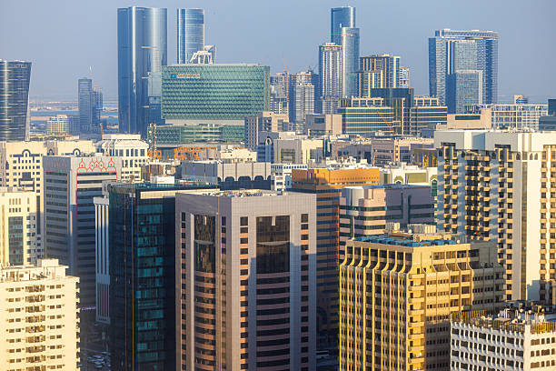 Aerial view of architecture in Dubai, residential area, modern tall buildings and corporate skyscrapers on the horizon