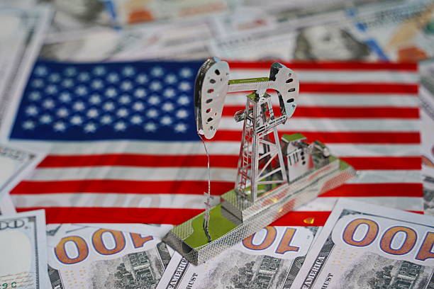 istock Dollar bills and miscellaneous items 2207139636