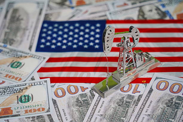 istock Dollar bills and miscellaneous items 2207139640