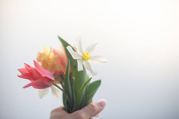 Woman with spring flowers portrait