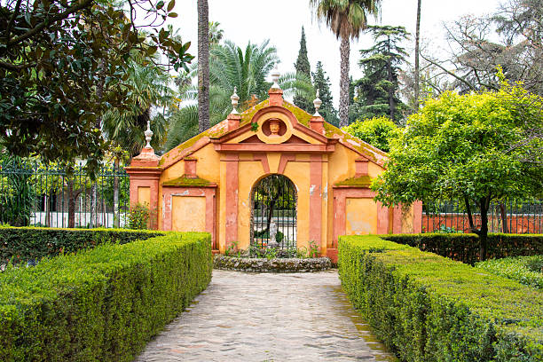 Seville, Spain - Mar 21, 2016: Visitors exploring the beautiful gardens at the Real Alcazar.
