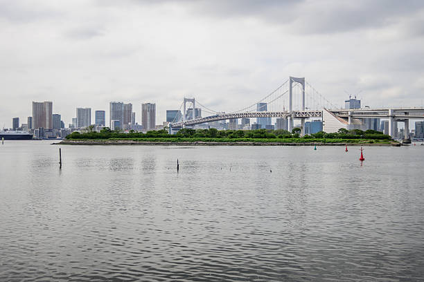 Rainbow Bridge over Tokyo Bay connects Shibaura and Odaiba. Completed in 1993, its a vital infrastructure and a landmark