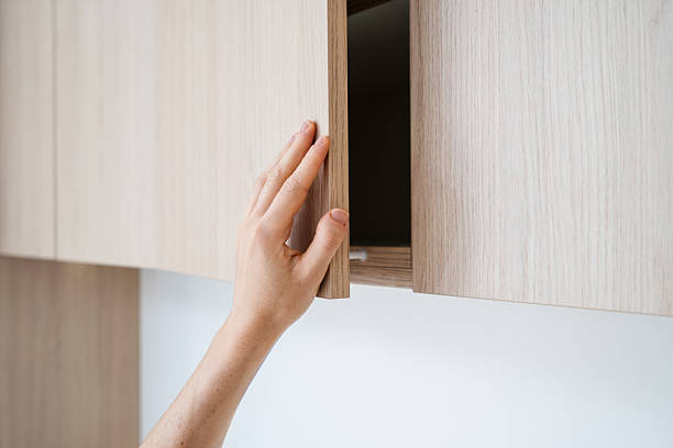 istock Discover elegant storage solutions in a modern minimalist wooden kitchen design 2207149985