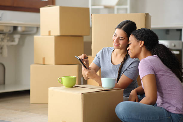istock Roommates drawing on phone planning house reform 2207154389
