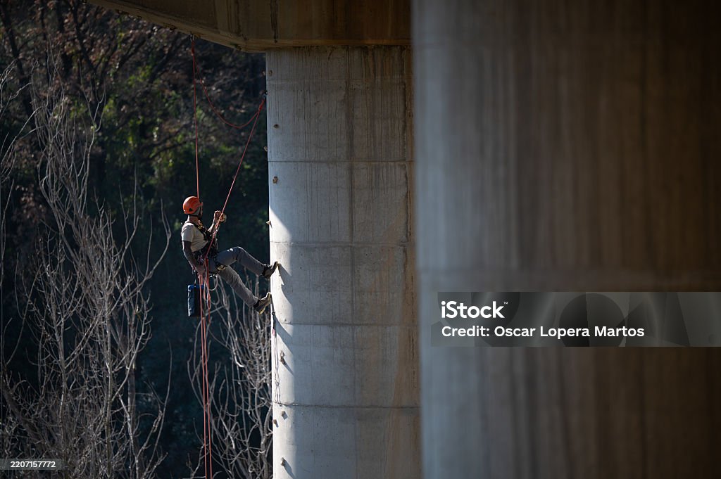 Pylon For Rope Rope Access Technician Inspecting Bridge Pylon Using Climbing Gear ...