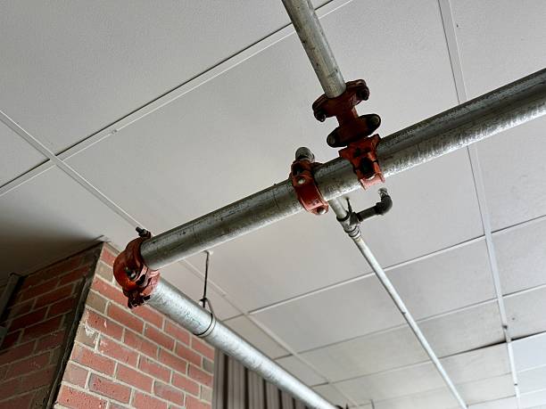 Fire sprinkler controls and test fittings for a commercial building.