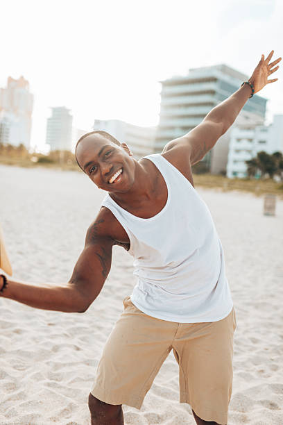 istock happiness black man on the beach 2207159141