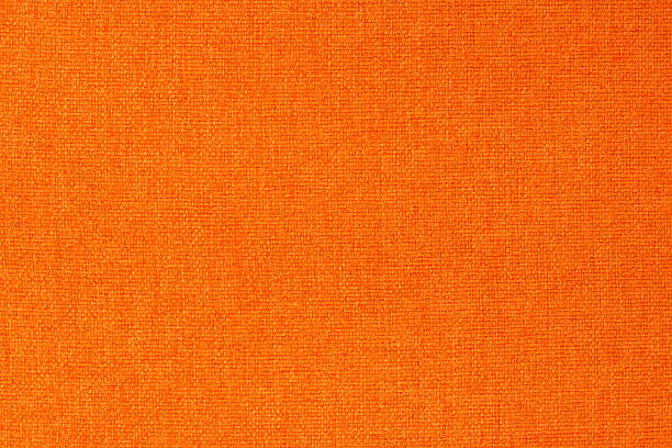 istock Orange cotton fabric texture background, seamless pattern of natural textile. 2207161821