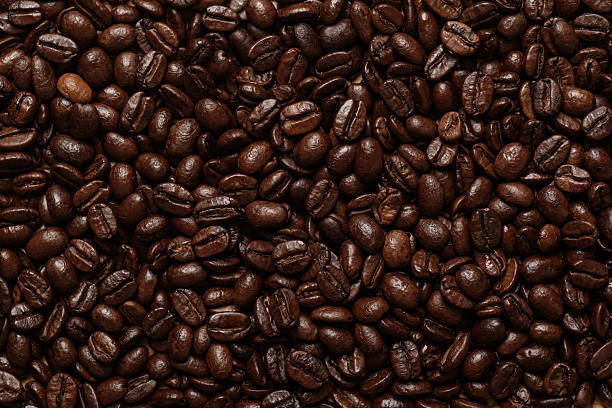 istock Background of brown roasted coffee beans 2207164060
