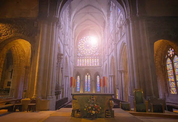 Photo of Sunlight illuminate cathedral stained glass interior, Saint Malo