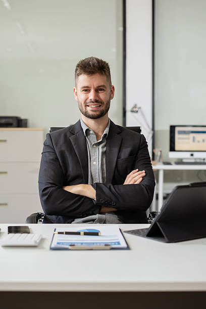 istock Smiling confident mature businessman leader looking at camera in office. 2207164434