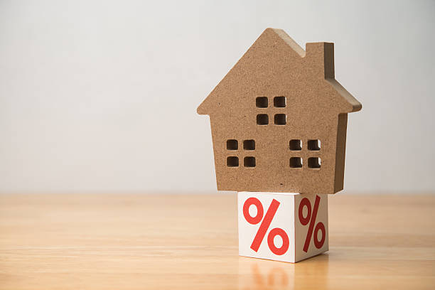 istock House on interest rate white wall background copy space. 2207164797