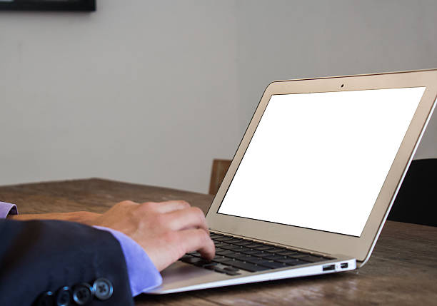 istock Young casual entrepreneur working on laptop at home office. 2207165864