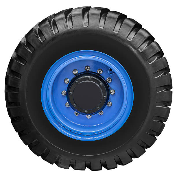 istock Blue wheel on tractor tire isolated on white background with clipping path 2207166007